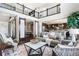 Open-concept living area with a kitchen view and a cozy office at 16069 Pikes Peak Dr, Broomfield, CO 80023
