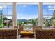 Picture window view of the neighborhood and mountains at 16069 Pikes Peak Dr, Broomfield, CO 80023