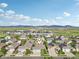 Neighborhood aerial view featuring well-maintained homes with lush landscaping at 9139 Flora St, Arvada, CO 80005