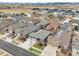 Aerial view shows a beautifully landscaped neighborhood with well-maintained homes and spacious yards at 9139 Flora St, Arvada, CO 80005