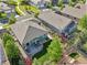 Aerial view of the backyard featuring a spacious deck and lush landscaping at 9139 Flora St, Arvada, CO 80005