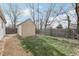 Backyard featuring a cream shed and fencing at 1540 E 95Th Ave, Thornton, CO 80229
