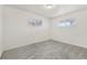 Cozy bedroom filled with light with neutral walls and carpet for a serene retreat at 1540 E 95Th Ave, Thornton, CO 80229