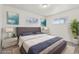 Stylishly furnished bedroom featuring soft carpet, comfortable bed, and artistic decor at 1540 E 95Th Ave, Thornton, CO 80229