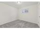 Cozy bedroom filled with light with neutral walls and carpet at 1540 E 95Th Ave, Thornton, CO 80229