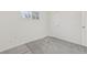 Small bedroom filled with light with neutral walls and carpet at 1540 E 95Th Ave, Thornton, CO 80229