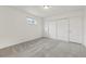 Bright bedroom with closet and door to another room at 1540 E 95Th Ave, Thornton, CO 80229