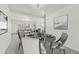 Bright dining room view looking towards the living room with stylish furnishings at 1540 E 95Th Ave, Thornton, CO 80229