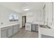 Charming kitchen showcasing a gas range, sleek countertops, and ample cabinet space at 1540 E 95Th Ave, Thornton, CO 80229