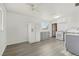 Bright kitchen with white appliances, gray cabinets, and durable gray flooring at 1540 E 95Th Ave, Thornton, CO 80229