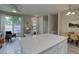 Bright living room featuring natural light, neutral tones, and an open floor plan at 1310 Hoyt St # 6, Lakewood, CO 80215