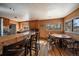 Dining area with a round wood table and natural light at 28539 Douglas Park Rd, Evergreen, CO 80439