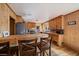 Kitchen featuring a butcher block island, wood cabinets, and natural lighting at 28539 Douglas Park Rd, Evergreen, CO 80439