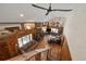 Spacious living room with high ceilings, stone fireplace, and an abundance of natural light at 28539 Douglas Park Rd, Evergreen, CO 80439
