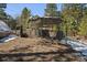 Outdoor space featuring a rustic metal gazebo at 28539 Douglas Park Rd, Evergreen, CO 80439