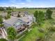 Aerial view of a neighborhood with lush green surroundings and walking path at 9467 W Plymouth Ave, Littleton, CO 80128