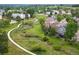 A scenic view showcasing the property adjacent to lush green space and a serene walking path at 9467 W Plymouth Ave, Littleton, CO 80128