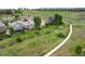 The property is surrounded by greenery at 9467 W Plymouth Ave, Littleton, CO 80128