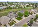 An elevated view of the property, surrounded by lush greenery, showcasing its prime location in the neighborhood at 9467 W Plymouth Ave, Littleton, CO 80128