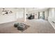 Spacious finished basement with large recreational area and modern decor at 9467 W Plymouth Ave, Littleton, CO 80128
