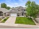 Beautiful two-story home with well-maintained lawn and a spacious two car garage at 9467 W Plymouth Ave, Littleton, CO 80128
