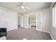 This spacious living room is accentuated with soft carpeting, and natural light at 9467 W Plymouth Ave, Littleton, CO 80128