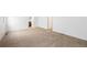 Spacious bedroom with neutral carpet and white walls offering a clean and bright living space at 14190 E Gunnison Pl, Aurora, CO 80012