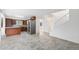Modern kitchen features stainless steel appliances, custom cabinets, and new flooring at 14190 E Gunnison Pl, Aurora, CO 80012