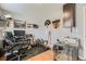 Well-equipped office space with desk, chair, and lots of decor at 15645 E Floyd Ave, Aurora, CO 80013