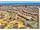 Aerial view of a community showcasing mature landscaping, parks and winding walking trails at 9588 Firenze Way, Highlands Ranch, CO 80126