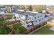 Aerial view of fenced backyard, patio, lawn and second story balcony in this modern home at 1353 Quaker St, Golden, CO 80401