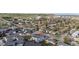 Overhead shot of modern gray home with fenced yard, patio, second story balcony, and mountain views at 1353 Quaker St, Golden, CO 80401