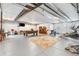 Spacious unfinished basement area with pool table, workout equipment, and ample storage at 1353 Quaker St, Golden, CO 80401