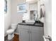 Modern half bath with a sleek vanity, stylish sink, and contemporary fixtures at 1353 Quaker St, Golden, CO 80401