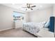 Bright bedroom featuring a large window and cozy decor at 1353 Quaker St, Golden, CO 80401