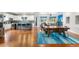 Spacious living space with hardwood floors, modern kitchen, and comfortable seating area at 1353 Quaker St, Golden, CO 80401