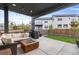 Inviting covered patio with cozy seating, fire pit, and backyard views, perfect for relaxation at 1353 Quaker St, Golden, CO 80401