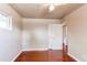 Bedroom with wood floors, neutral paint, ceiling fan, and closet at 9150 Lilly Ct, Thornton, CO 80229