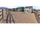 Spacious backyard with gravel and a fence, perfect for outdoor living and recreation at 15833 Little Bluestem Rd, Monument, CO 80132