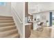 Open concept kitchen with an island, pendant lighting, and stainless steel appliances at 15833 Little Bluestem Rd, Monument, CO 80132