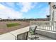 A view from a patio showcases outdoor furniture, creating an inviting space to relax and enjoy the natural landscape at 15833 Little Bluestem Rd, Monument, CO 80132