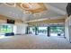 Large community clubhouse featuring open doors leading to a patio and outdoor seating at 9378 Longstone Dr, Parker, CO 80134