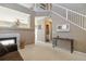 Open-concept space featuring a fireplace, stairway, and neutral colored decor at 9378 Longstone Dr, Parker, CO 80134