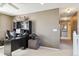 Bright office space features a large desk and hallway access at 9378 Longstone Dr, Parker, CO 80134