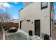 A private backyard features a dining area, minimalist landscaping, and plenty of room to gather at 1845 W 33Rd Ave, Denver, CO 80211