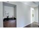 Bar area with wood cabinetry, decorative flowers, and drinkware at 9995 E Harvard Ave # 155, Denver, CO 80231