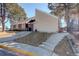 Community clubhouse featuring well-maintained landscaping and accessibility ramps, embodying both style and practicality at 9995 E Harvard Ave # 155, Denver, CO 80231