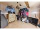 Bedroom featuring storage, wood paneled walls, and ample space, this room is ready to be made your own at 860 Zenobia St, Denver, CO 80204