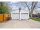 Detached two-car garage equipped with a basketball hoop, offering convenience and recreation for homeowners at 860 Zenobia St, Denver, CO 80204