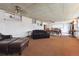 Relaxing living area featuring ample seating and a comfortable ambiance, perfect for gatherings or quiet evenings at 860 Zenobia St, Denver, CO 80204